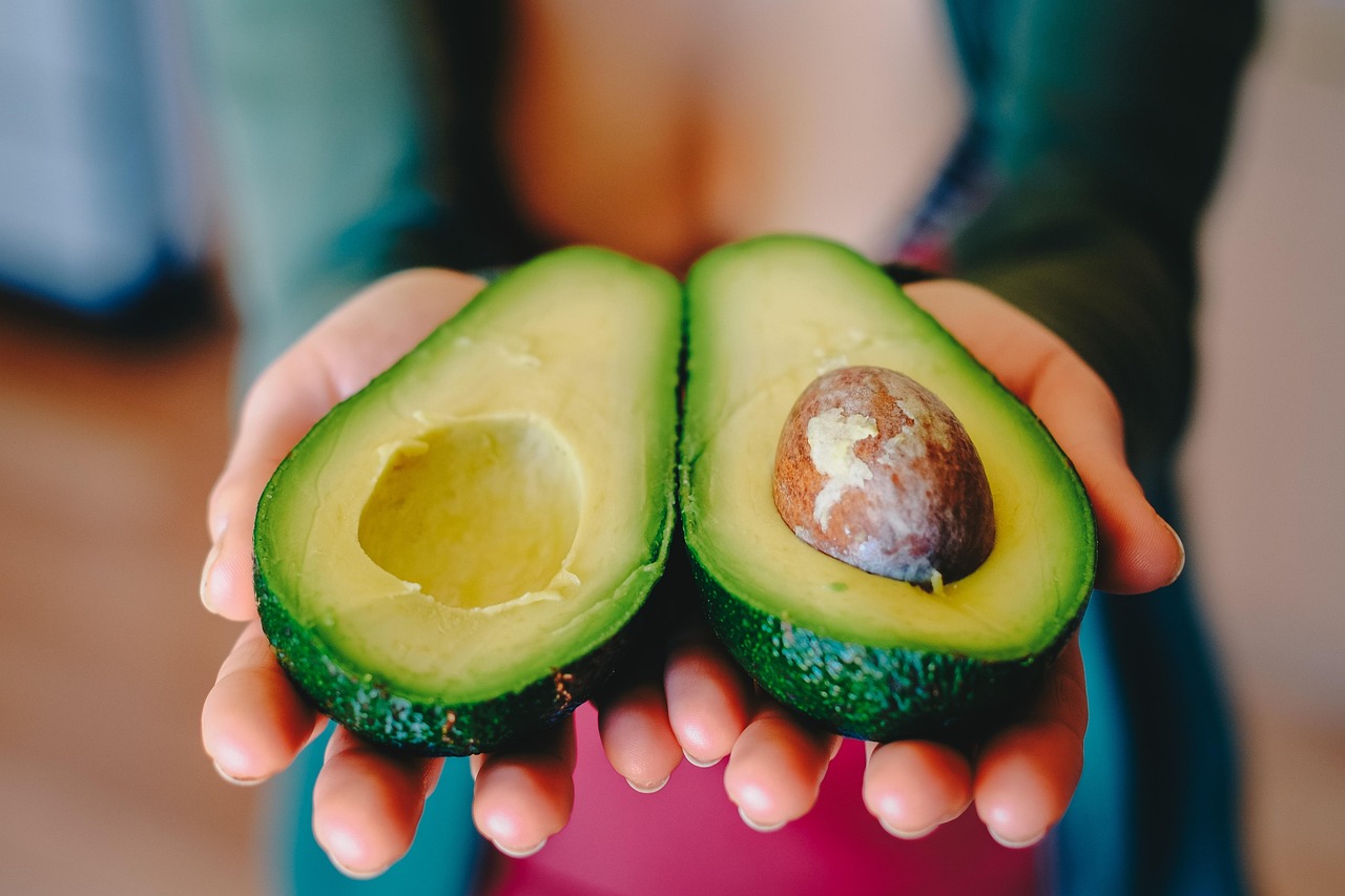 Fresh avocado and lime, essential Mexican cooking ingredients